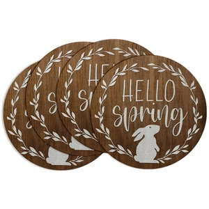 Set of four circular wooden coasters with rabbit silhouette and Hello Spring design