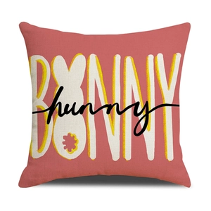 Pink linen Easter pillow cover with BUNNY typography for festive sofa decoration