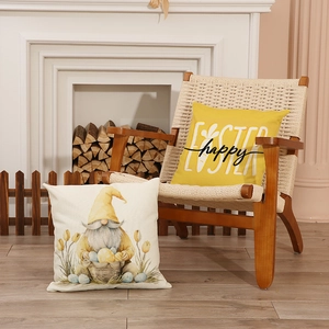 Easter decorative pillows set with Happy Easter print and gnome pattern on a cozy chair