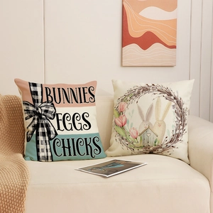 Fundas de cojín de Pascua de lino con motivos de conejos y letras festivas en un sofá