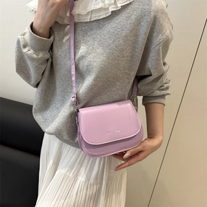 Minimalist light purple flap crossbody bag with adjustable strap and fashion lettering