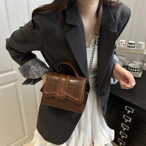 Brown crocodile pattern leather crossbody bag with metal chain strap and top handle