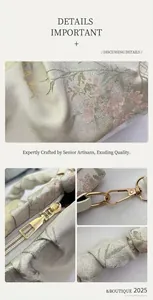 Close-up of floral jacquard fabric and gold hardware on this chic small square bag
