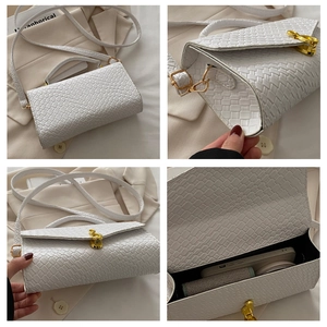 Detail view of white woven texture handbag showing golden lock and multi-angle layout