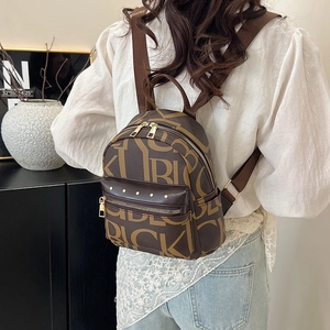 Chic monogram PU leather backpack with gold zippers and adjustable straps for women