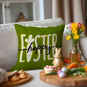 Bright green Easter pillow cover with bunny and carrot design on a cozy white sofa