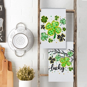 St. Patrick's Day kitchen towels with lucky clover design on white microfiber