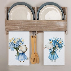 Detail of absorbent Easter tea towels featuring cute watercolor hedgehog and lamb prints