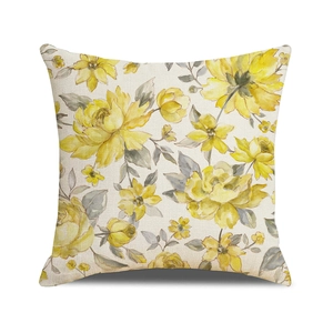 Floral print pillow covers in yellow and grey watercolor design with linen texture fabric