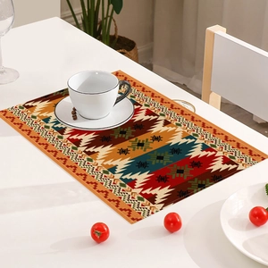 Bohemian linen placemat with geometric patterns on a white dining table with coffee set