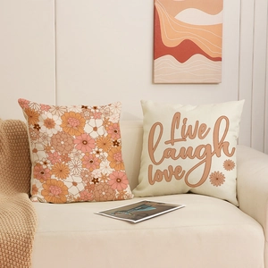 Linen decorative pillows with vintage flower pattern and Live Laugh Love text print