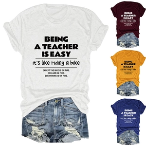 Detail showing various colors of teachers quote printed cotton t-shirts with casual shorts
