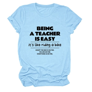 Light blue crew neck t-shirt with humorous teacher quote slogan in bold black text