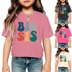 Detail of soft cotton kids t-shirts with BIG SIS lettering in four colors