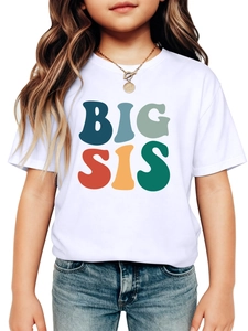 Close-up of white cotton t-shirt featuring colorful Big Sis lettering and soft fabric texture