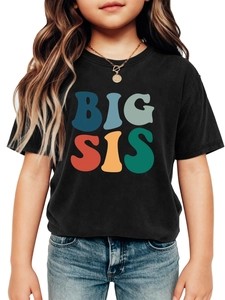 Close-up of kids black cotton T-shirt featuring colorful BIG SIS retro art font print
