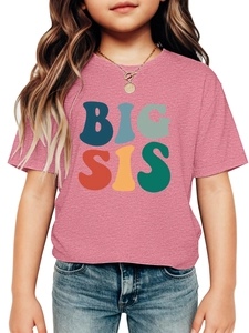 Detail of a pink cotton T-shirt featuring a colorful retro BIG SIS printed slogan