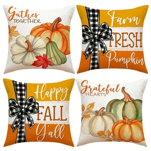 Set of four autumn pumpkin linen pillow covers with maple leaves and black white bow