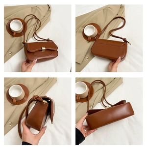 Detailed four-way view showing the brown leather crossbody bag with gold buckle hardware
