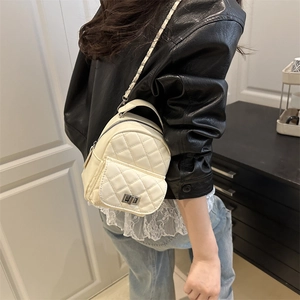 Chic white quilted mini backpack with diamond pattern and metal chain strap for women