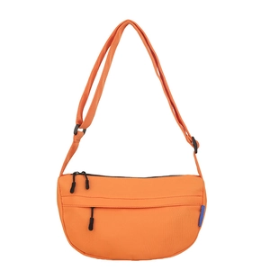 Minimalist bright orange half-moon crossbody bag in waterproof nylon with adjustable strap