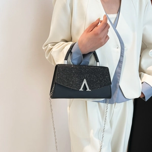 Sparkling black evening clutch bag with sequins and V-shaped metal buckle for weddings