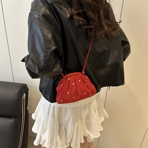 Red floral fabric crossbody bag with white flower pattern and cloud-like pleats