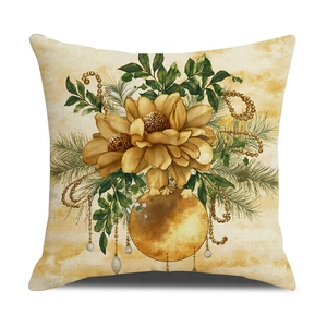 Christmas cushion cover with golden floral patterns and pine branches on linen fabric
