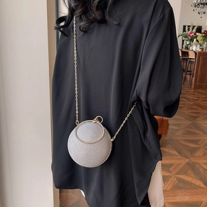 Silver spherical sequin evening bag with gold chain strap for party or formal occasions