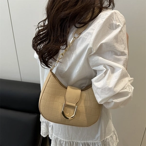 Elegant beige crocodile pattern hobo bag with gold chain and U-shaped buckle on shoulder