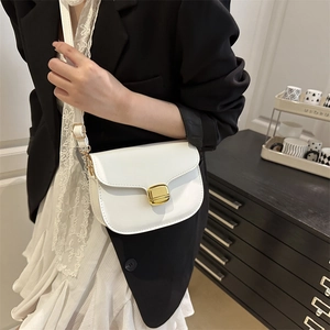 Minimalist white semi-circular crossbody bag with golden square buckle and leather strap