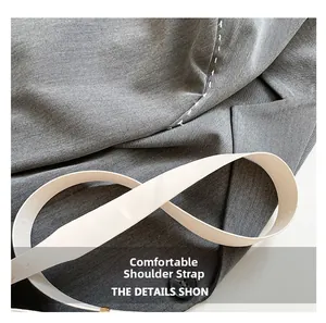 Detail of comfortable white wide strap and gray textured fabric with fine stitching