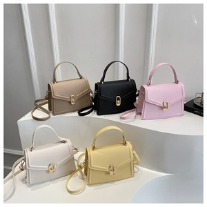 Collection of minimalist square crossbody bags in five colors with gold turn-lock closure