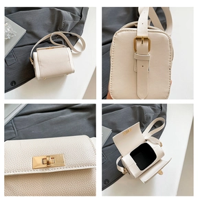 Macro details of cream square bag showing lychee leather texture and golden metal lock