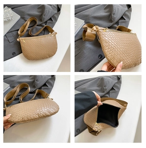 Detailed views of khaki woven crossbody bag with wide strap and golden zipper detail