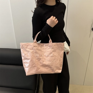 Vintage-Tragetasche in Rosa aus strukturiertem Canvas-Stoff mit modernem Buchstabendruck