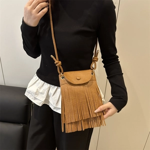 Crossbody phone bag for women with boho tassels in a sleek brown faux leather design