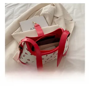 Interior view of cherry print tote bag with zipper compartment and large capacity