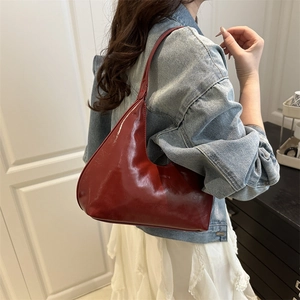 Fashionable burgundy high-gloss half-moon hobo bag with smooth shiny finish for women