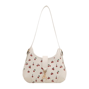 Retro crescent hobo bag with red cherry print and golden ring buckle detail