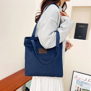 Minimalist large capacity dark blue denim tote bag with leather fashion tag for women