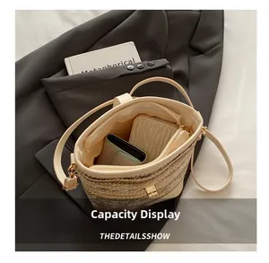 Internal capacity view showing storage for wallet and card holder in woven bucket bag