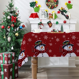 Red Christmas tablecloth with snowman and snowflake prints for festive dining decor
