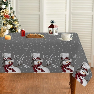 Detailed view of grey polyester Christmas tablecloth featuring snowmen and Let It Snow text