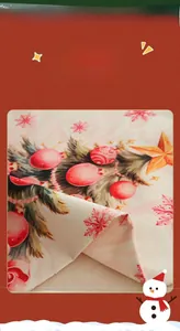 Detail of Christmas chair cover fabric showing festive linen prints and soft texture