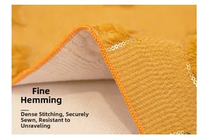 Close-up of ginger plush table runner featuring golden sequins and durable stitched edges