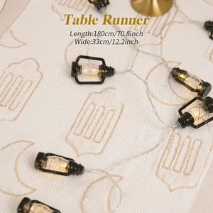 White embroidered table runner with gold lantern patterns and moon sequins for festive decor