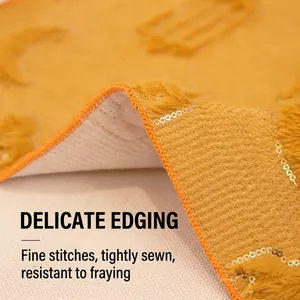 Close-up of yellow moon embroidered table runner with sequins and durable stitching