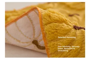 Close-up of precise pumpkin placemat stitching and high-density reinforced edging