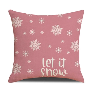 Pink Let It Snow Christmas pillow cover with white snowflake prints on linen fabric